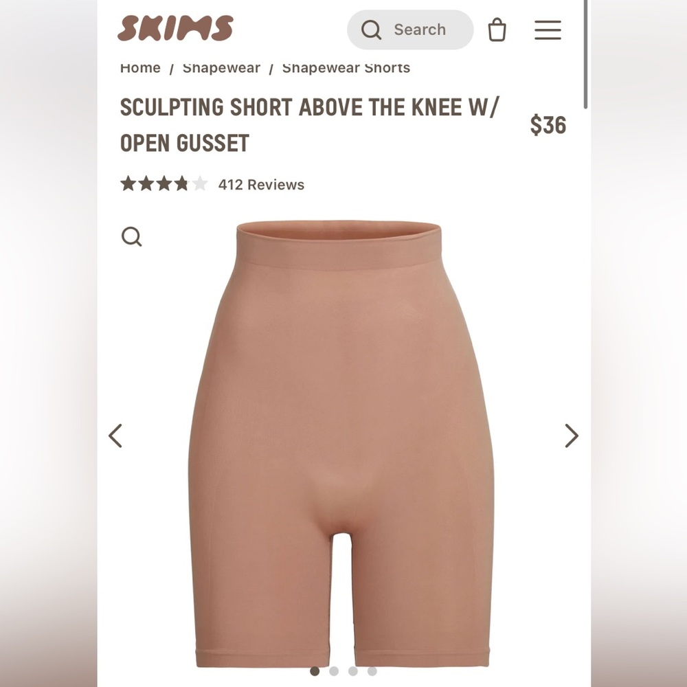 SKIMS sculpting shorts above knee